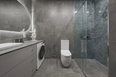 a bathroom with a toilet sink and a shower at IVIS House - Spacious Apartment with Terrace, Vilnius Old Town in Vilnius