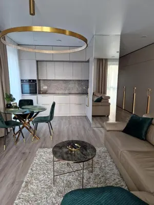 a living room with a couch and a table at Life Story in Kaunas