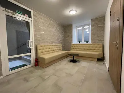 a waiting room with two couches and a window at Modern guest house in city center I Room 2 in Vilnius