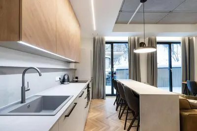 a kitchen with a sink and a counter at Renaissance Key Apartment 29 in Vilnius