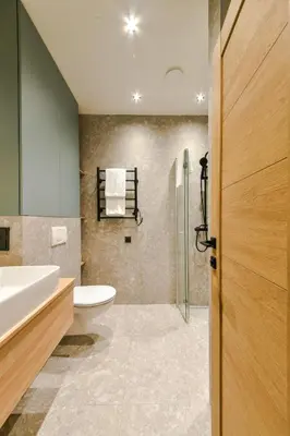 a bathroom with a toilet and a sink and a shower at Apartments in Vilnius in Vilnius