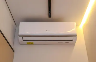 a white printer sitting on top of a shelf at Apartments in Vilnius in Vilnius