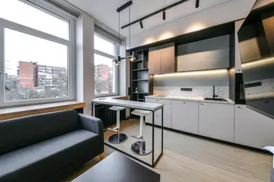 a living room with a couch and a table at Apartments in Vilnius in Vilnius