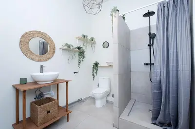 a bathroom with a sink and a toilet at Bali house Vilnius in Vilnius