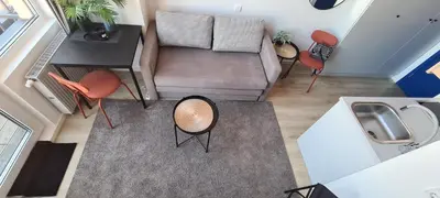 an overhead view of a living room with a couch and chairs at Stay in Kaunas & LA51 Loft - Free Parking in Kaunas