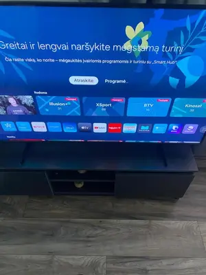 a laptop computer sitting on top of a table at Trumpalaikė Nuoma-Apgyvendinimas in Rokiškis