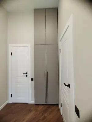 an empty room with a closet and a door at Stylish Central Station Old Town Apart FREE PARKING in Vilnius