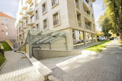 a building with a gate in front of a building at Studio Mindaugas in Vilnius