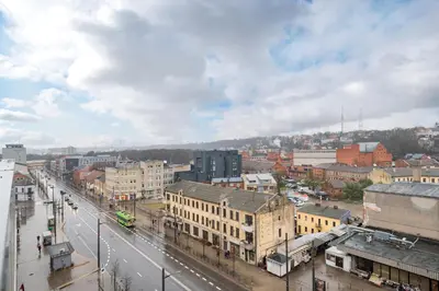 a view of a city with buildings and a street at Lovely city panorama apartment by Polo Apartments in Kaunas