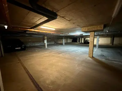 an empty parking lot in an empty parking garage at Liepu Apartments Druskininkai in Druskininkai