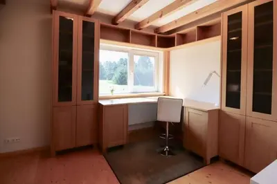 a home office with a desk and a window at 3-bedroom villa surrounded by beautiful nature in Vaišvydava