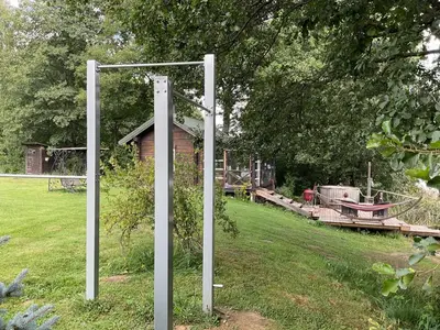 a pole in the middle of a field with a boat at Pirtelė Arjola in Kaltanėnai