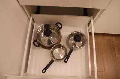 three measuring spoons in a white box with at NEW Apartment J22, Free Private Parking, Terrace, Self Check-in in Kaunas