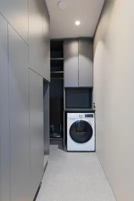 a laundry room with a washer and dryer at HOUSE38 Panoramic View Apartments SELF CHECK-IN in Kaunas