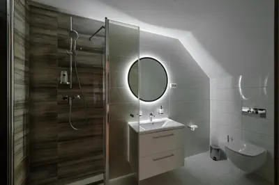 a bathroom with a shower and a sink and a mirror at Jonavos alpakų svečių namai in Jonava