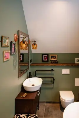 a bathroom with a sink and a toilet at Aušrinės in Liškiava
