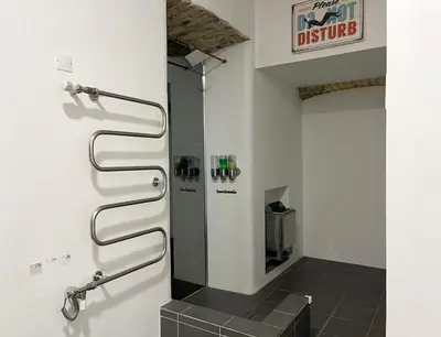 a bathroom with a shower with a glass door at 4Work & Leisure I SELF-CHECKIN I 3PARKING I CENTRAL STATION DISTRICT - simpletone in Vilnius