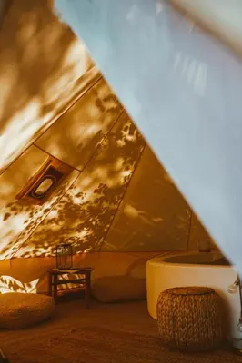 a room with a tent with a table at 