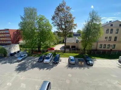 an overhead view of a parking lot with cars parked at Šiauliai CENTER Višinskio NEW self check In in Šiauliai