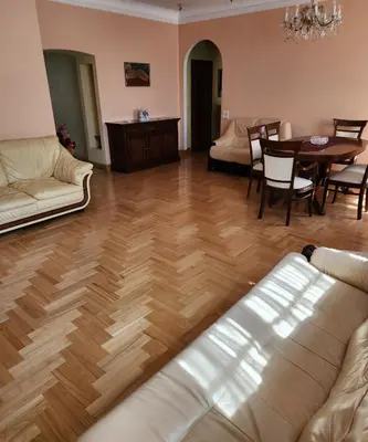 a living room with a couch and a table at HaPPy Inn ArkA the heart of Old Town, Self-Check-in, A-C, Car-Parking, Balkony in Vilnius