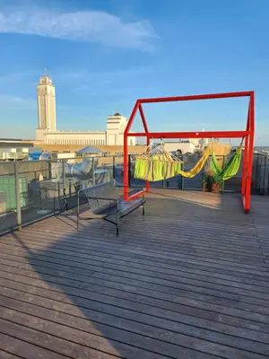 a playground on a roof with a swing at Radio City loft - apartment 420 in Kaunas
