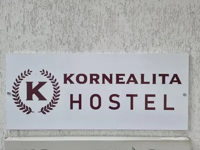 a sign that says koreanatal hospital on a wall at Apgyvendinimo įstaiga KORNEALITA in Zarasai