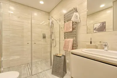 a bathroom with a shower and a sink at Home in in Druskininkai