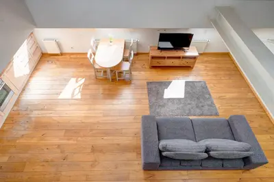 an overhead view of a living room with a couch at Charming Loft in Vilnius Oldtown in Vilnius