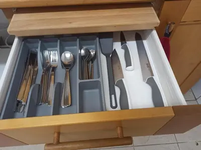 a drawer filled with utensils in a kitchen at Bed&Blues in Vilnius