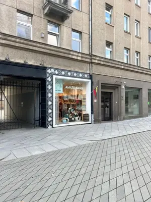 a store front of a building with a large window at Arena apartment in Kaunas